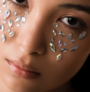Rhinestones on the face: a new bright trend